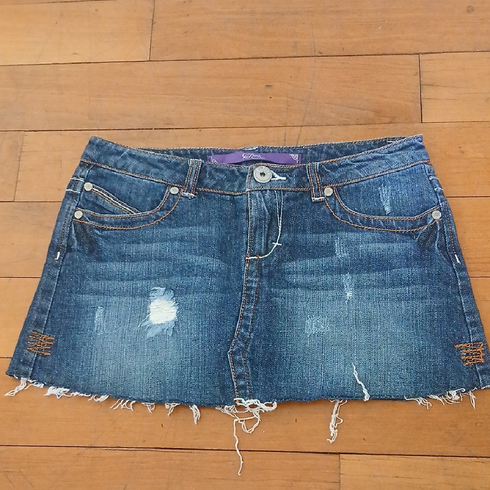 C. PINK Denim Mini Skirt With Tulip Back Pockets Raw Hem